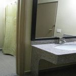 two double beds room bathroom